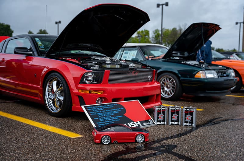 S197 Mustang in black and red with display