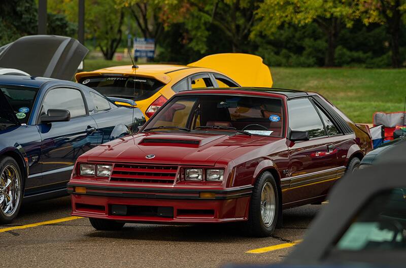 Red four eyed foxbody mustang