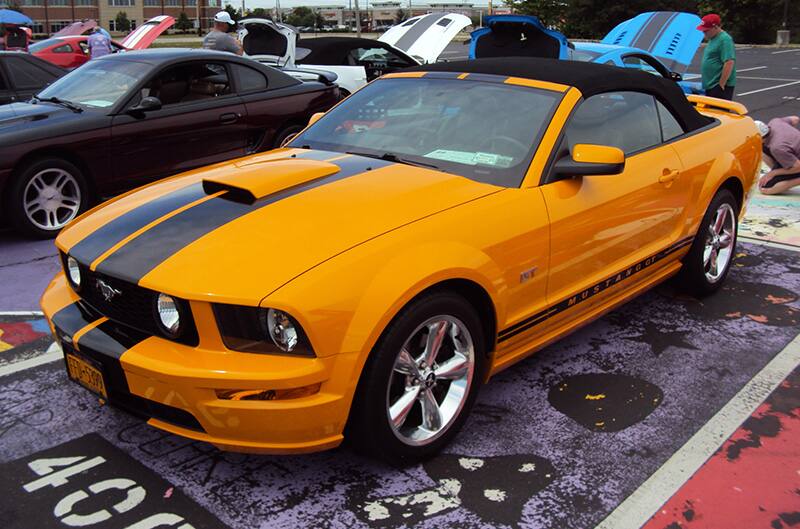Orange S197 Mustang with black stripes