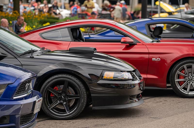 front end of newedge mustang along side others