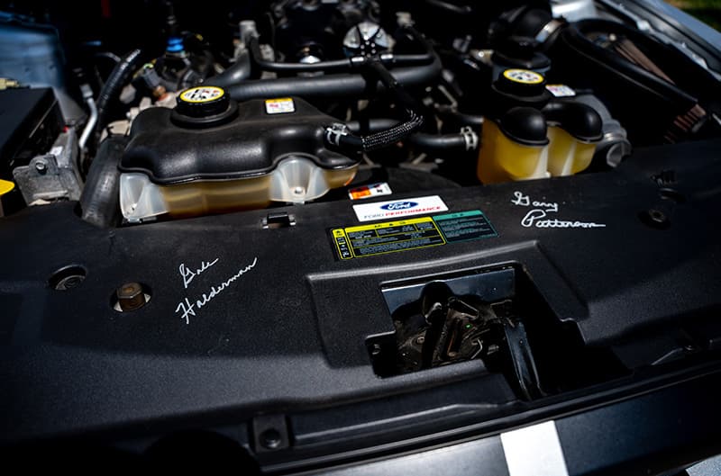 Engine bay with signatures