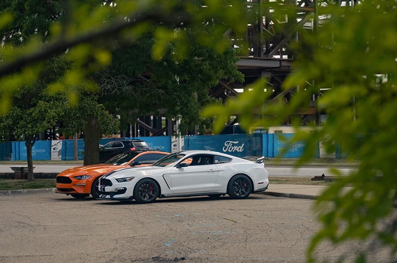 White S550 Mustang with Orange S550 Mustang