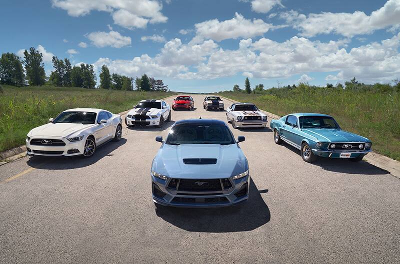 All seven generation mustangs in photo shoot