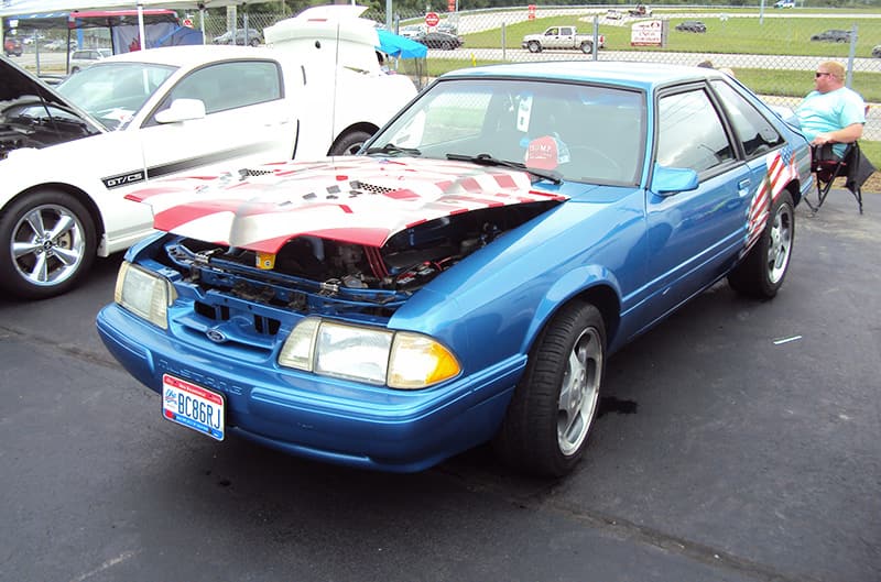 Blue Foxbody with american flag hood