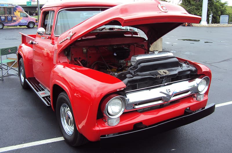 Red Ford F100 with hood open