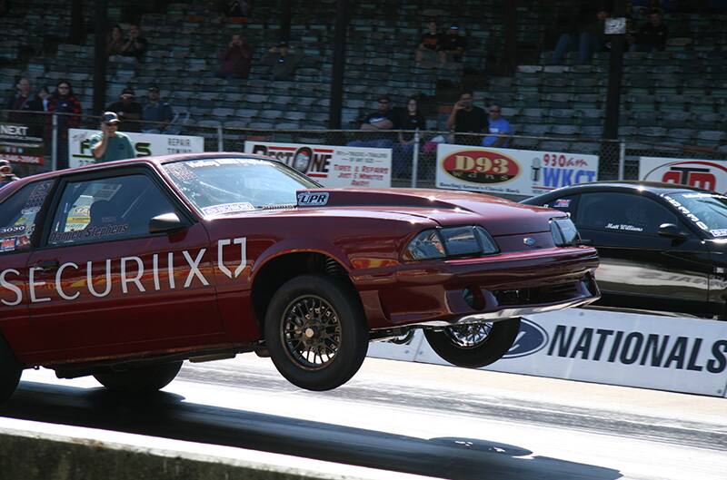 foxbody mustang wheelie on dragstrip