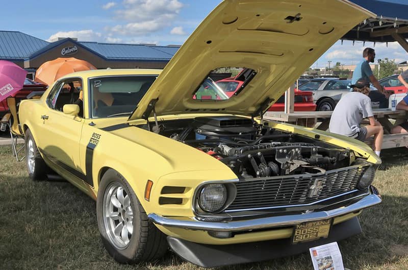 Yellow First generation ford mustang fastback