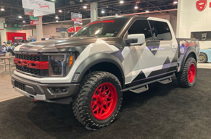 ford raptor camo jacked up