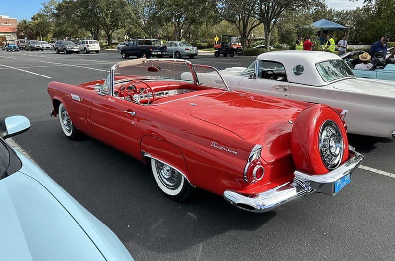 Red 60s ford thunderbird convertible