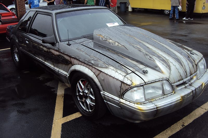 Foxbody Mustang with custom paint and hood