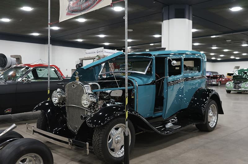 black and blue ford sedan