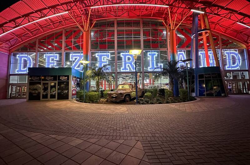 Front of Museum at night with lights on