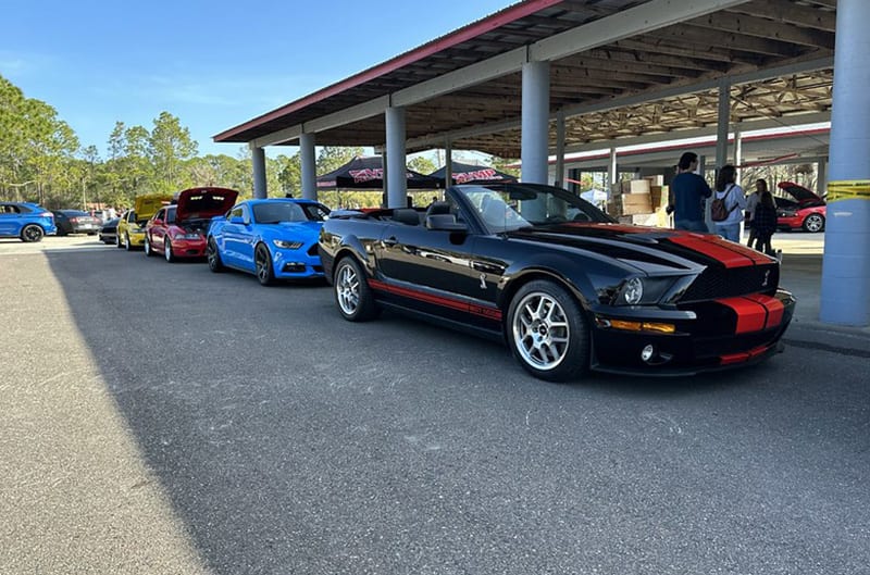 Several mustangs parked at VMP