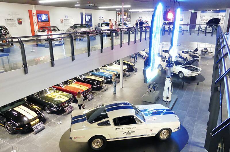 Overview of Segerstrom museum with many Shelby Mustangs