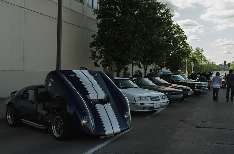 Shelby and Ford vehicles parked on the street