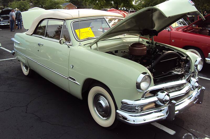 Light green ford sedan