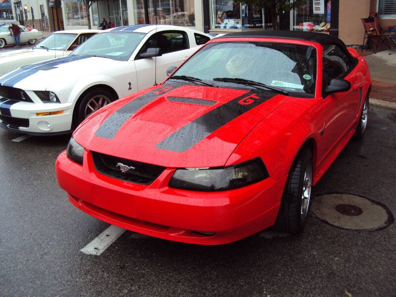 Red Fouth generation Ford Mustang