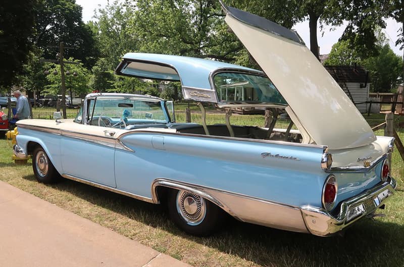 Ford Fairlane convertible with top retracting