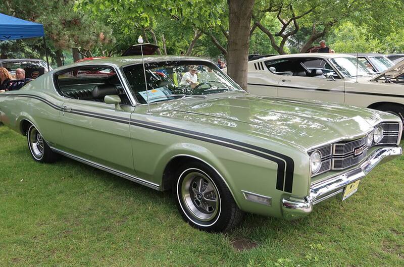 Green Ford Torino with black graphic stripe