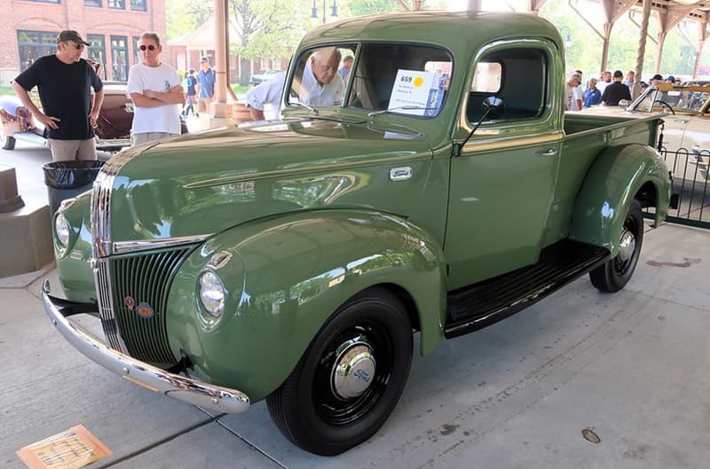 Muted green 1950s ford pickup truck