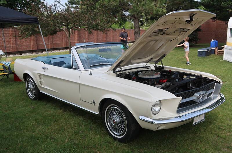 White first gen mustang convertible