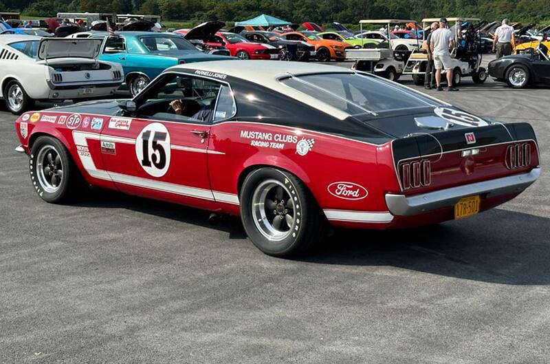 Red and black first generation Mustang racecar