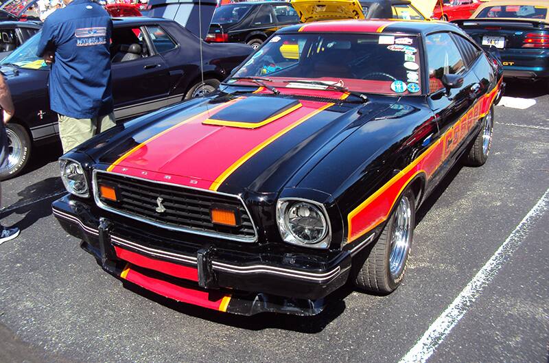 Black mustang II with red and orange accents