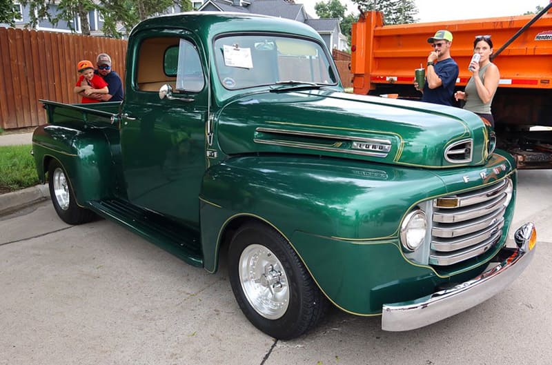 Green Ford F100 Pickup truck