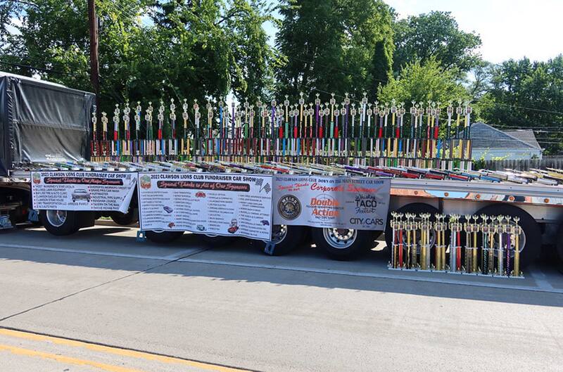 Trophies on the back of a flat bed semi trailer