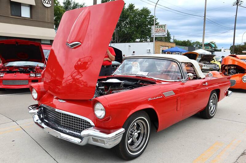 Ford thunderbird convertible with hood open in reverse