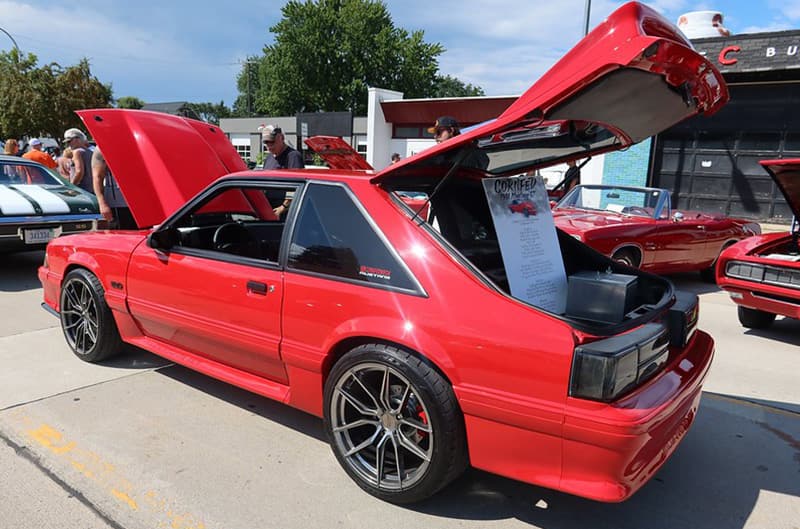 Red Mustang foxbody hatch back
