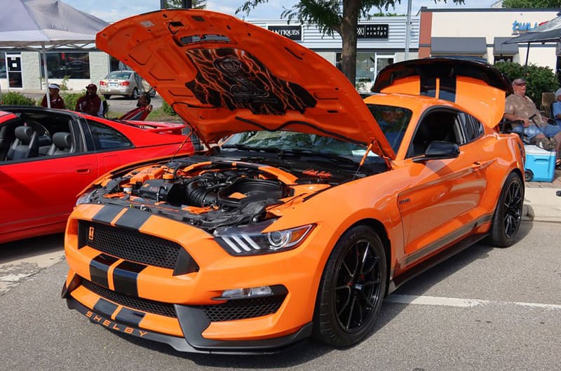 Orange Shelby GT350 Mustang with black stripes