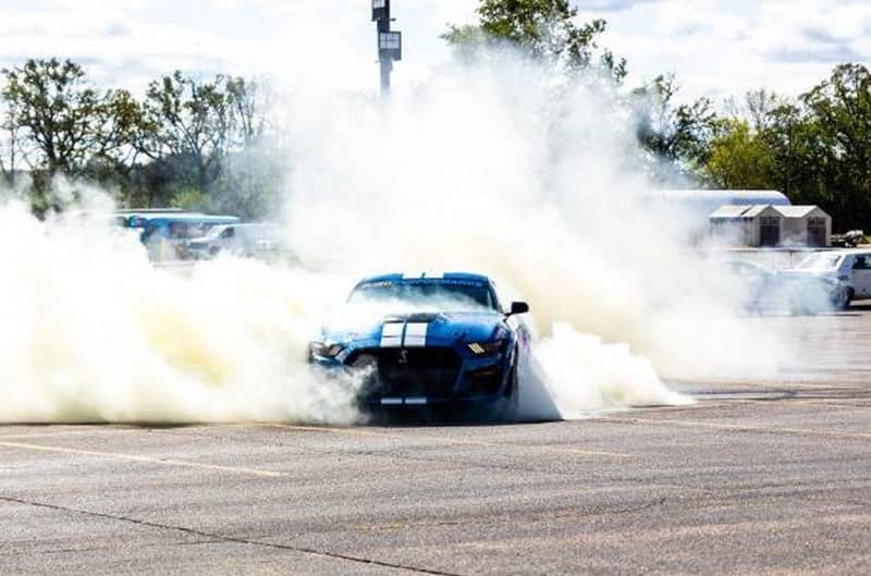 Mustang GT500 burnout with large smoke cloud