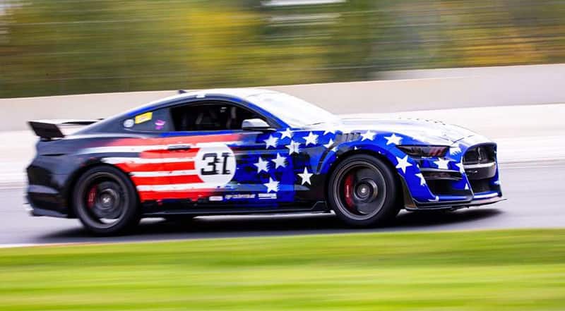 American flag themed GT350 on track