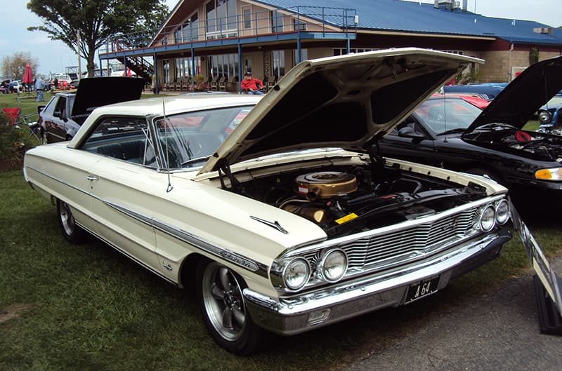 Ford fairlane with hood open on display