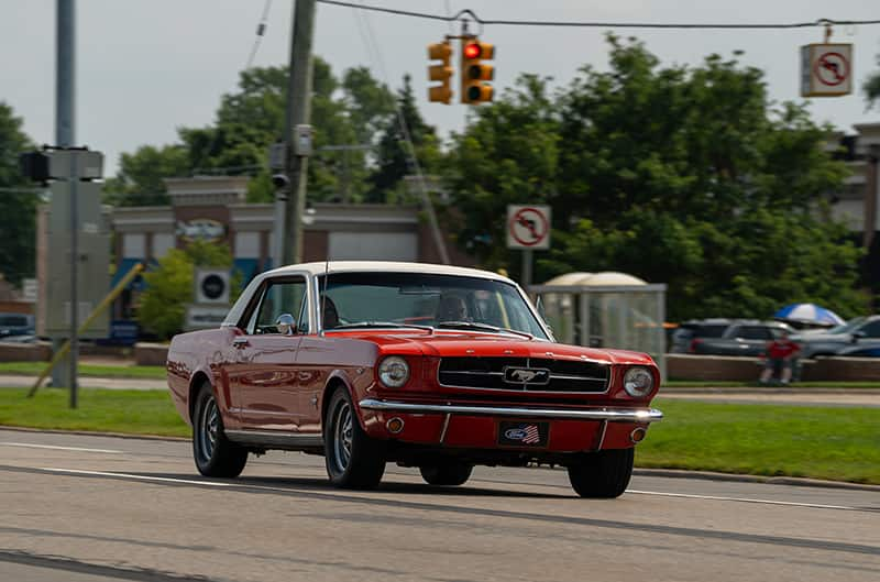 Red First gen mustang on woodward