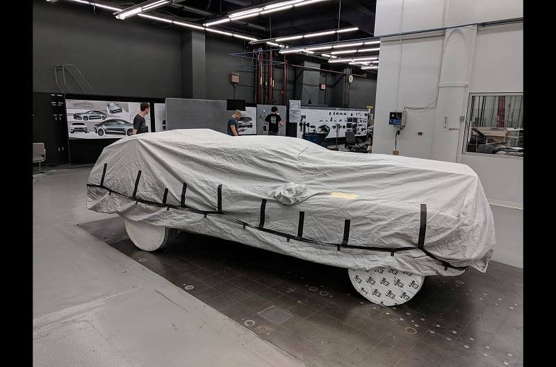 The Bullitt number 559 all covered and taped in disguise for its transport to the Cobo Center in Detroit