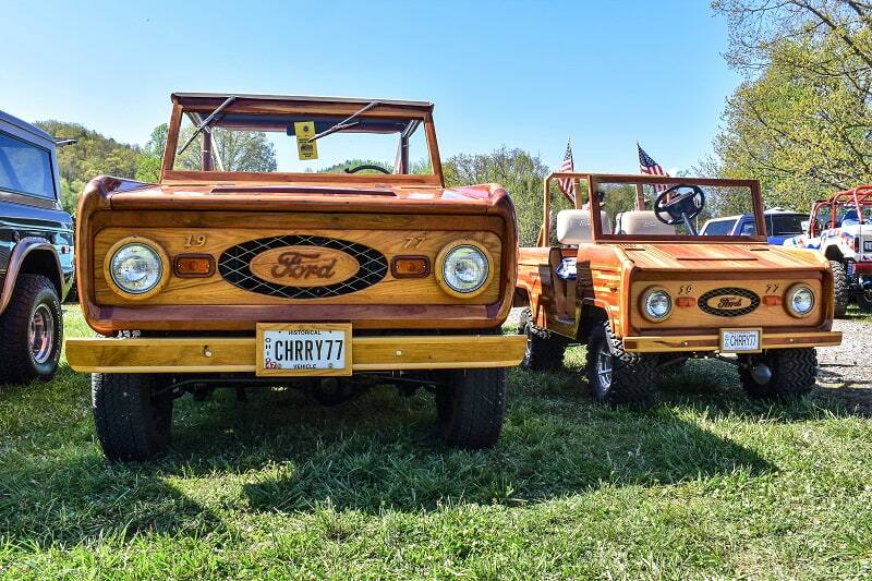 Front view of two wooden styled Broncos