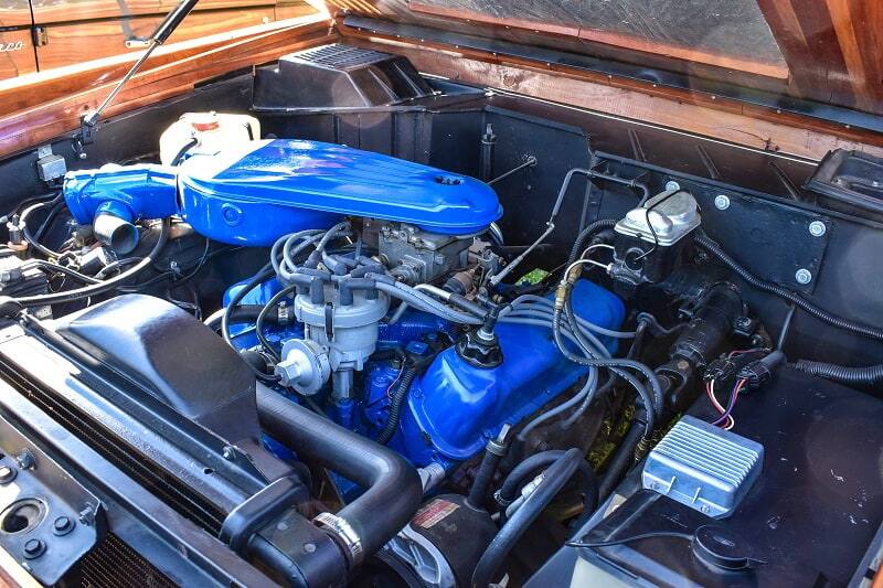 Close up of under the hood of wooden styled Bronco