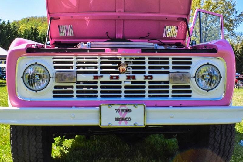 Close up front view of pink Bronco with hood up