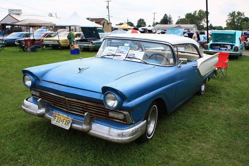 Blue Ford Torino in the grass