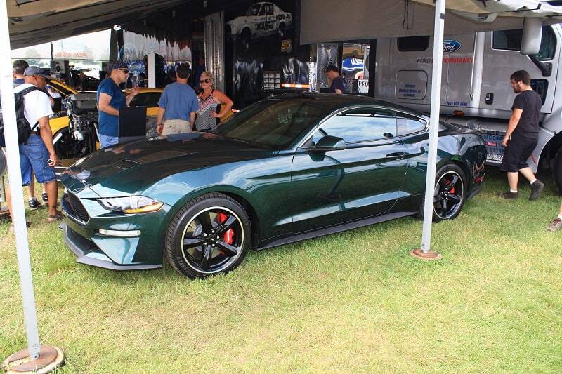 Green Mustang Bullitt under the tent