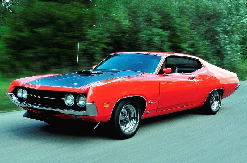 Front profile of red Torino Cobra on road