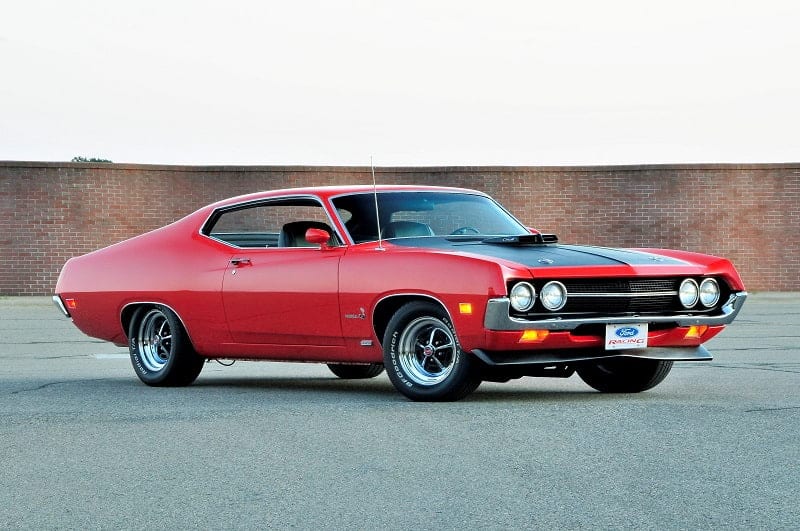 Front profile of red Torino Cobra in parking lot