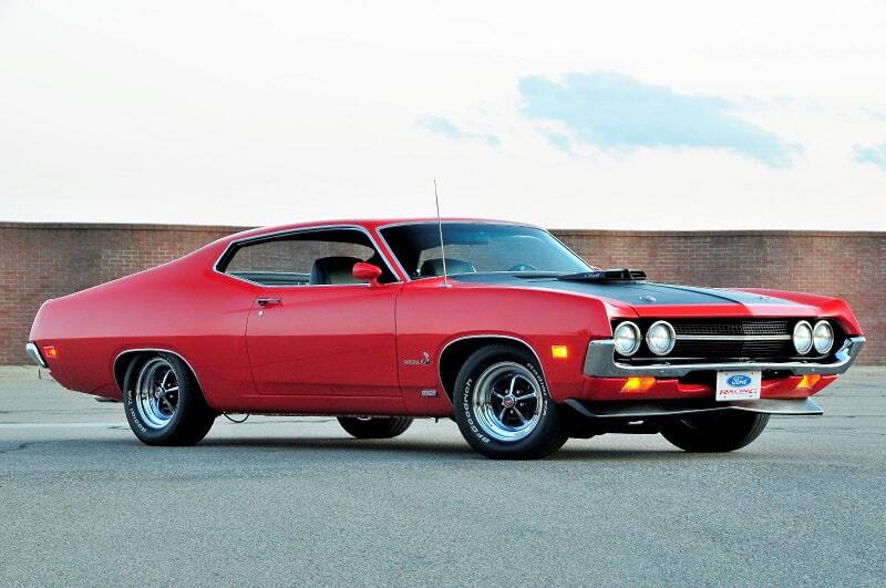 Front profile of red Torino Cobra in parking lot