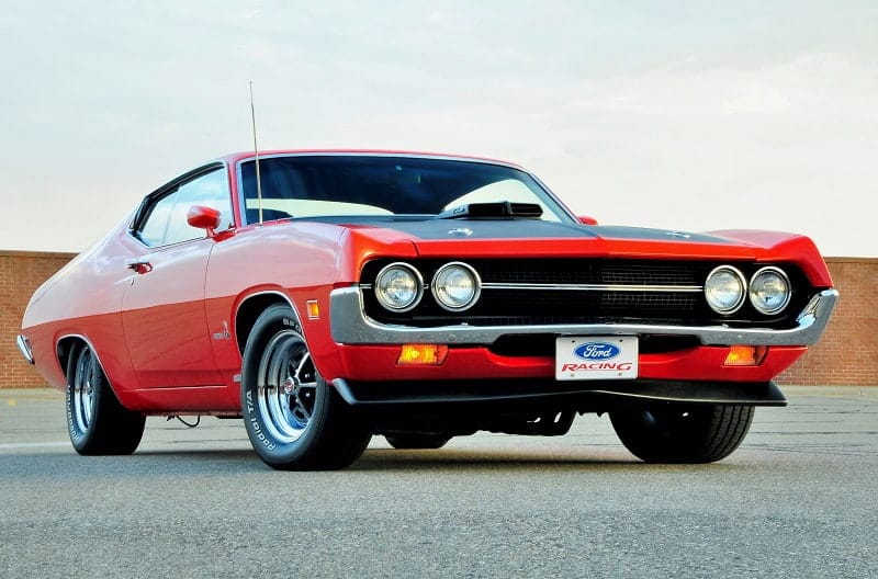 Front of red Torino Cobra in parking lot