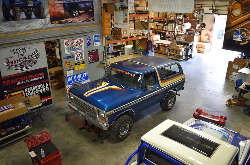 Overhead view of blue Bronco in garage