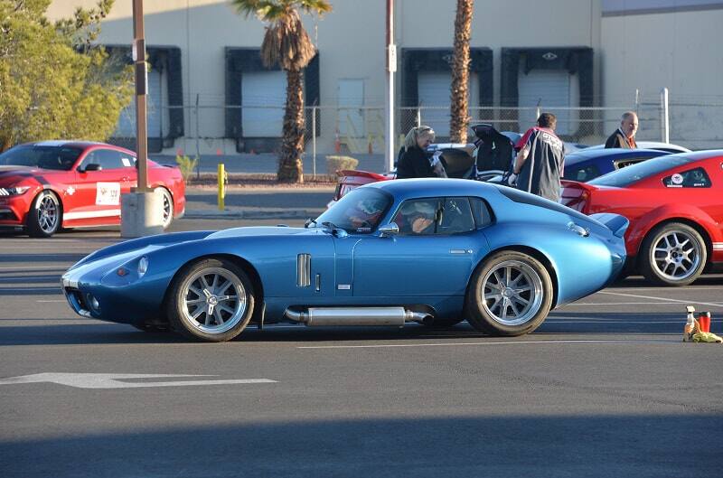 Profile of blue Shelby parked in parking lot