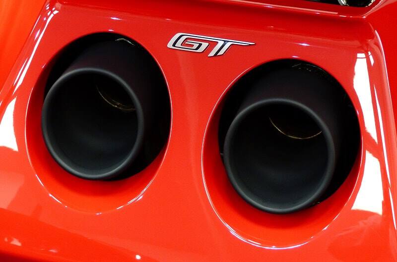 Close up of GT logo over exhaust pipes