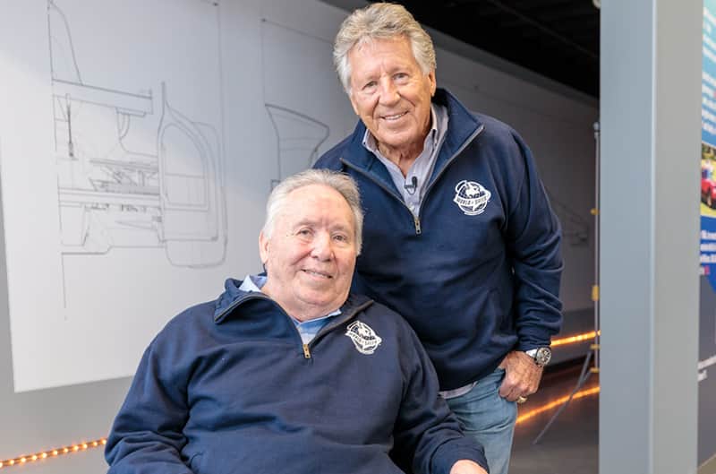 Mario Andretti and Granatelli posing next to each other